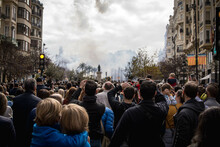 Multitude Of People Attentively Observing The Explosion Of Firecrackers Of The Mascleta De Valencia In Fallas From The Town Hall Square