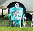skeleton sitting by RV
