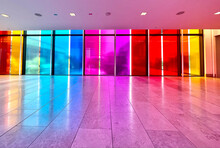 Colorful Glass Windows In Mall Hallway With Rainbow Colors Reflection On The Floor