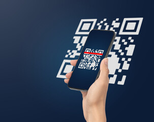 hand using mobile smart phone scan qr code. barcode reader, qr code payment, cashless technology, di