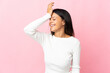 © luismolinero - Caucasian girl isolated on pink background has realized something and intending the solution