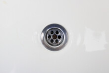 Stainless Steel Sink Background With Plug Hole, Top View.