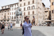 © fotoplaton - Young handsome guy tourist on the square in Europe