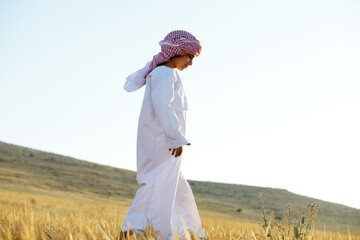 Wall Mural - Arabic happy child in nature