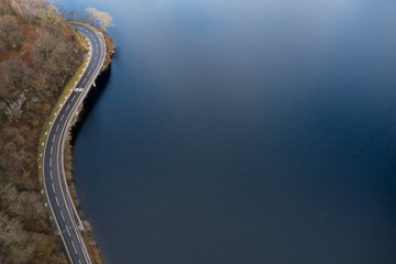 Loch Lomond aerial view showing the A82 road during autumn