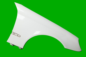 Canvas Print - White plastic fender on a green chroma key isolated background in a photo studio for sale or replacement in a car service. Mudguard on auto-parsing for repair or a device to protect body from dirt