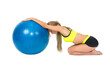 A shapely woman is exercising with a rehabilitation ball