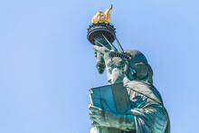 Digital Art Of Statue Of Liberty On Blue Sky Background