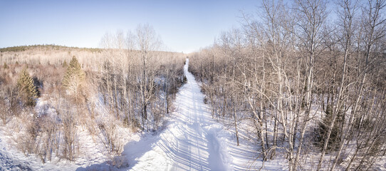 Wall Mural - Aerial Winter Snow Mobile Trail In Northern Ontario Canada