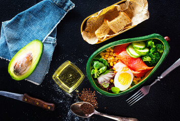 Poster - broccoli salnon and boiled egg in ceramic bowl served with corn and seeds