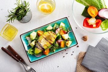 Canvas Print - Healthy cuisine. Fresh green salad with avocado