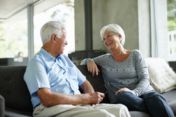 Poster - When someone elses happiness is your happiness, that is love. Shot of a senior couple sitting in their living room.