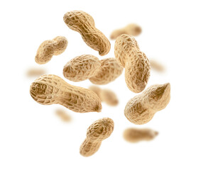 Wall Mural - Peanuts in the shell levitate on a white background