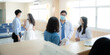 © chokniti - professional doctor and medicine person team have a conversation to talking in hospital about medical health care work, wearing surgical face mask