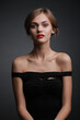 © Max - expressive studio portrait of a young attractive girl in a black dress