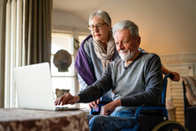 Loving Older Couple In A Nursing Home Together. Senior People Technology Concept