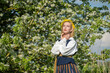 © zanna_ - Beautiful feminime woman in national dress with white spring flowers