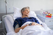 © Rido - Hospitalized senior woman sleeping at hospital