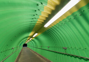 Empty pedestrian tunnel at night. Architecture abstract background