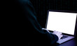 Hacker computer cyber security. Digital laptop in hacker man hand isolated on black banner. Internet web hack technology. Data protection, secured internet access, cybersecurity.