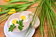 Traditional Polish soup served with bread and eggs. Easter decoration. Sour soup