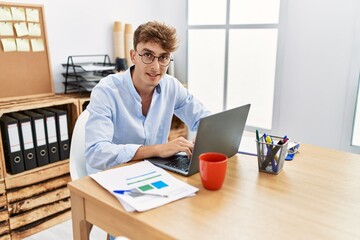 Sticker - Young caucasian man smiling confident working at office