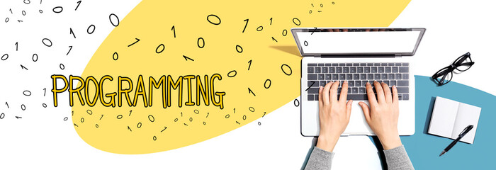 Programming with person using a laptop computer