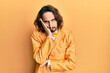 © Krakenimages.com - Young hispanic man wearing hipster elegant look thinking looking tired and bored with depression problems with crossed arms.