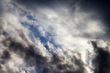 Wall Mural - Sky with sunlight and dark clouds