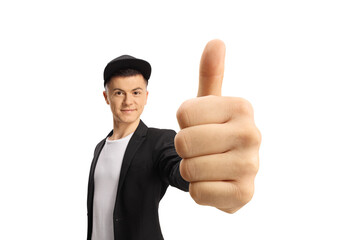 Canvas Print - Cheerful fashionable guy showing thumbs up