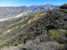 An Aerial Drone UAV View Of The Mill Creek Valley Below The Snow Covered San Gabriel Mountains In California