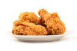Fried chicken on white plate on white background.