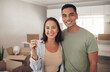 © Jeff Bergen/peopleimages.com - This is the key to a new beginning for us. Shot of a couple holding up the house key to their new home.