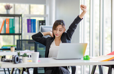 asian young tired exhausted lazy sleepy female businesswoman secretary employee staff in formal suit