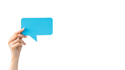 Blank speech bubble. Feedback message. Digital communication. Female hand holding blue dialogue icon mockup for text isolated on white empty space background.