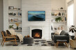 © New Africa - Cozy living room interior with comfortable sofa, armchairs and decorative fireplace