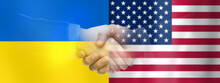 Political, Business And National Concept - Close Up Of Handshake Over Flag Of Ukraine And United States Of America On Background
