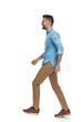© Viorel Sima - casual bearded guy with chino pants looking to side and smiling