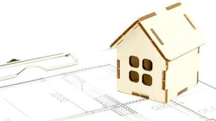keys and the layout of the house on the drawings. the concept of buying and building housing