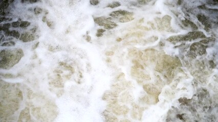 Wall Mural - Close up of fast flowing water slow motion