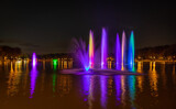 Fototapeta Miasto - Colorful fountains, Zalew Nowohucki, Krakow, Poland