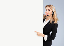Call Center. Customer Support Service Female Phone Operator Or Sales Agent In Headset, Confident Suit Standing Behind Signboard With Copy Space Area For Text, Isolated Over Yellow Background