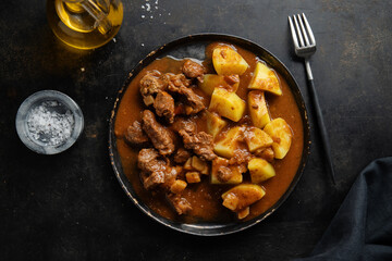 Canvas Print - Meat and potato stew on plate