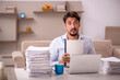 © Elnur - Young businessman employee working from home during pandemic