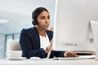 © Neil B/peopleimages.com - Communicating in an effective manner. Shot of a young businesswoman working on a computer in a call centre.