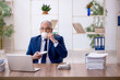 © Elnur - Old male employee drinking coffee during break
