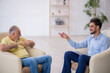 © Elnur - Old man visiting young male psychotherapist