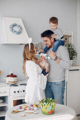 Wall Mural - Family with little son in a kitchen