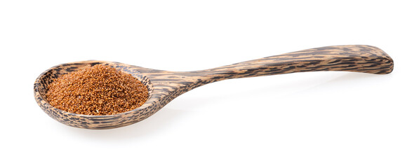 Brown Teff Grain in wood spoon on white