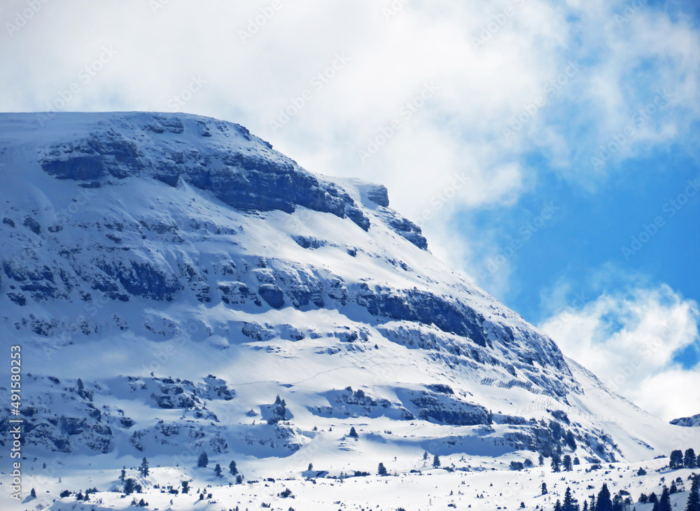 Snow-capped alpine peak Gamserrugg (or Gamser Rugg 2075 m) in the ...